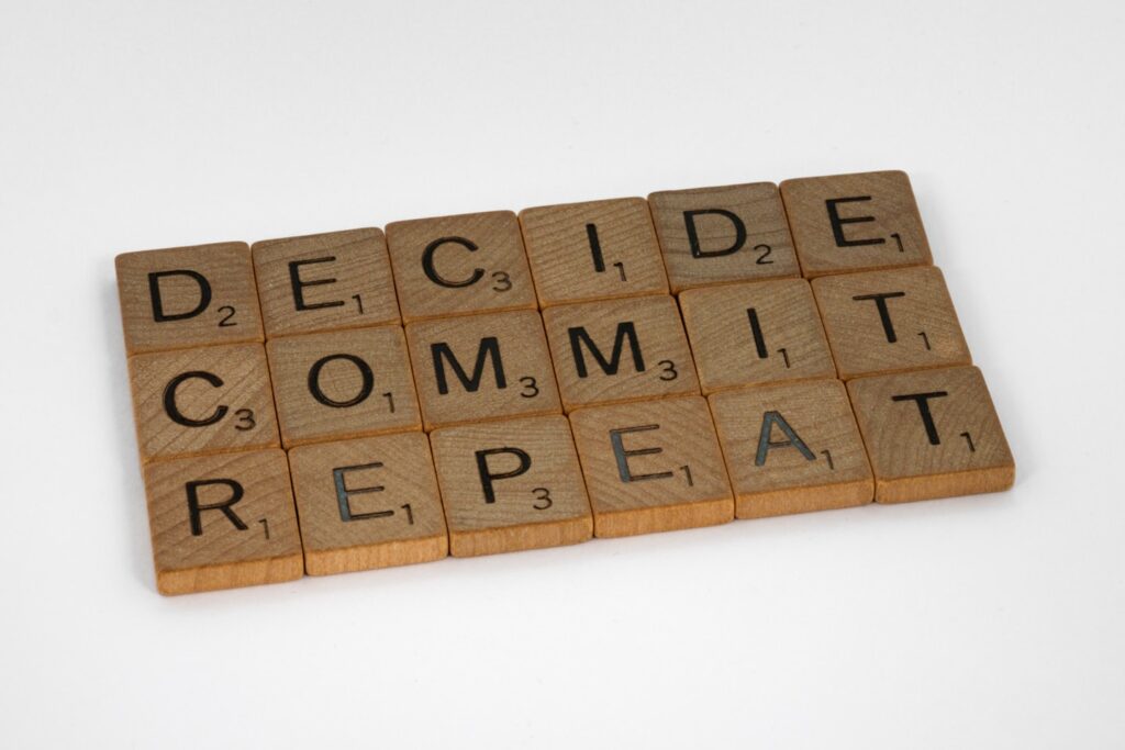 scrabble, scrabble pieces, lettering, letters, wood, scrabble tiles, white background, words, quote, letters, type, typography, design, layout, focus, bokeh, blur, photography, images, image, decide commit repeat, discipline, relentless, training, decisions, action, plan, dream, life, real life, progress, make progress, mindfulness, seize the day, carpe diem, live live, live life to the full,